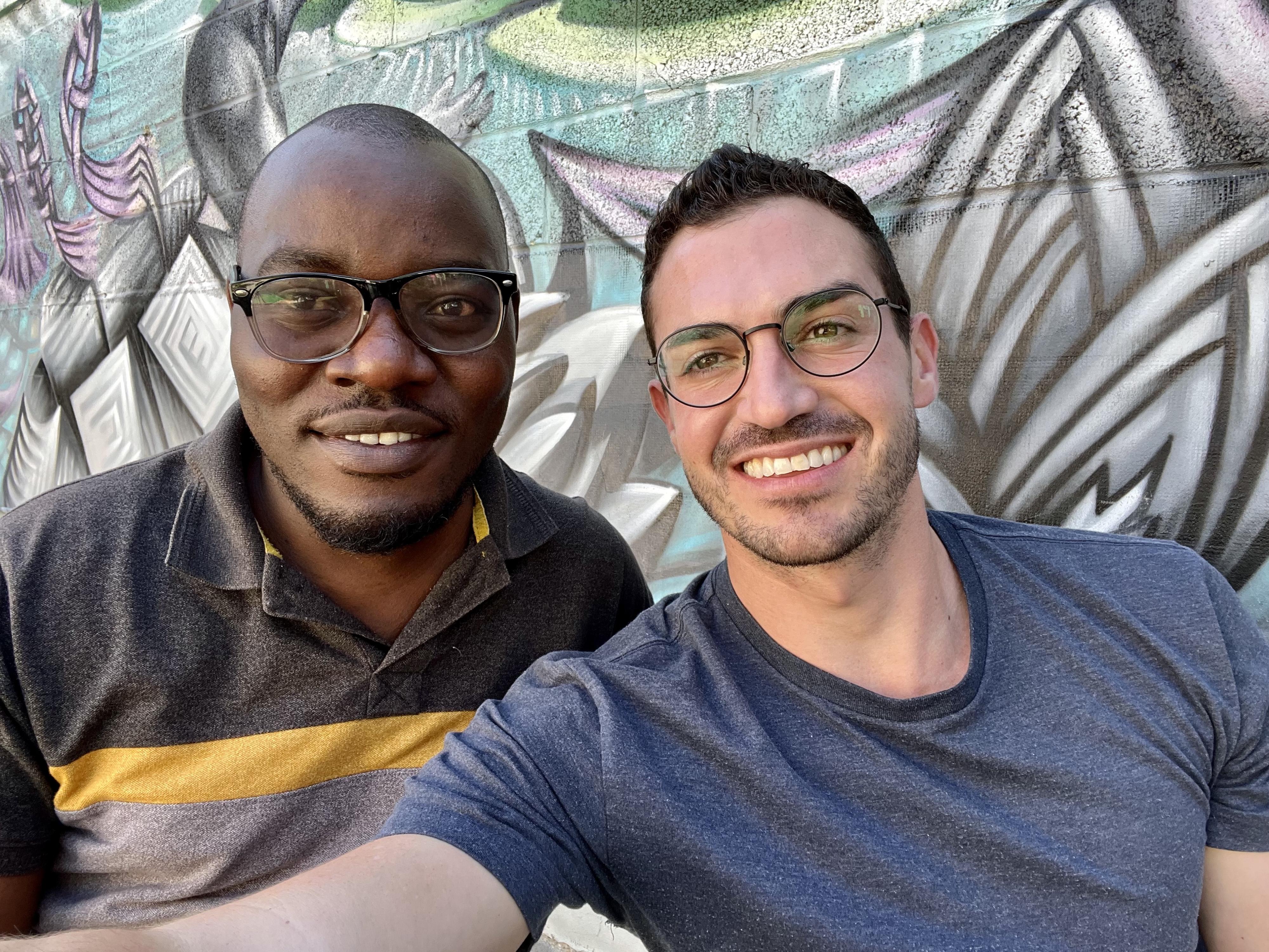 Rwandan WHE fellowship, theo and patrick smiling together in a selfie