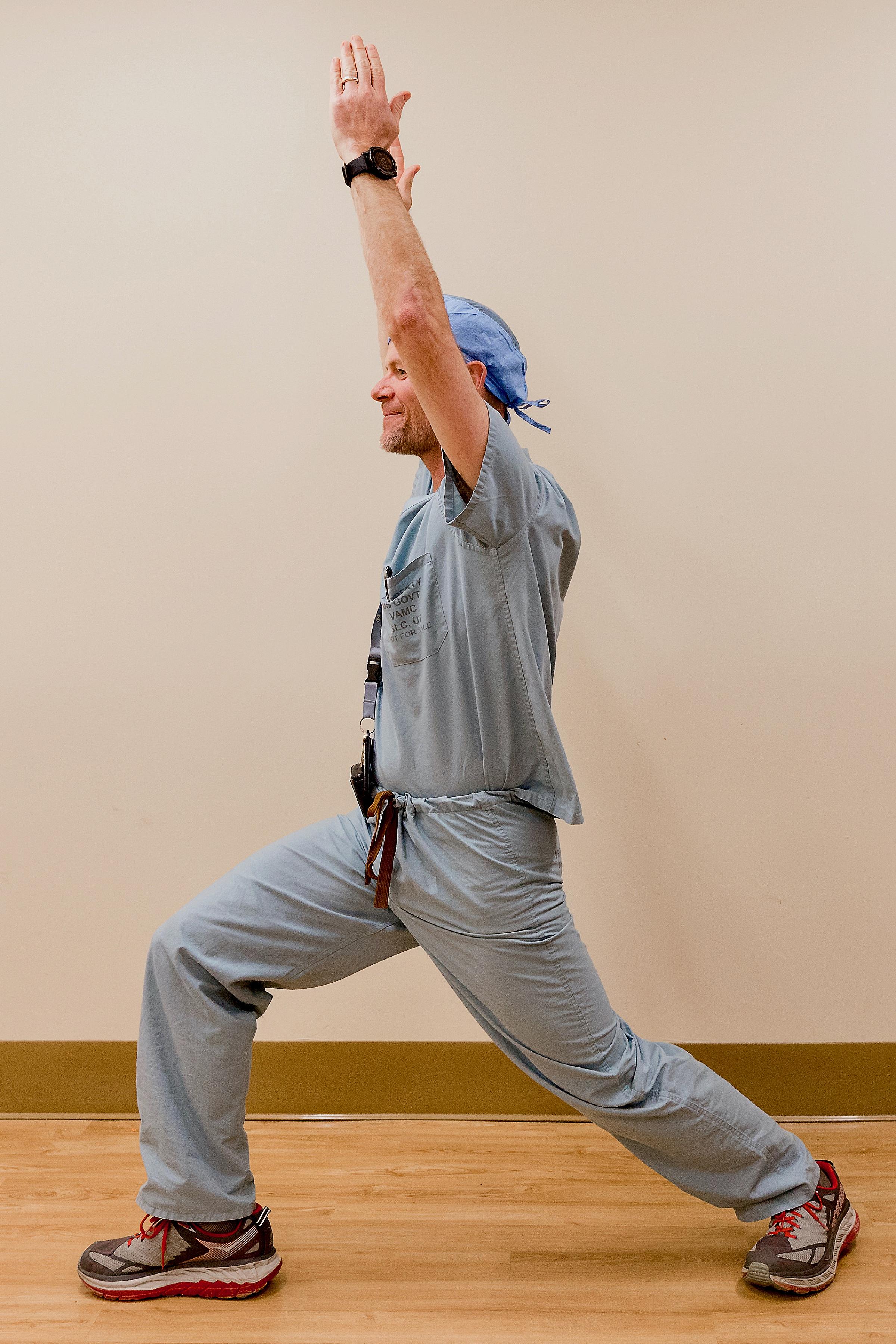 Man in warrior I pose