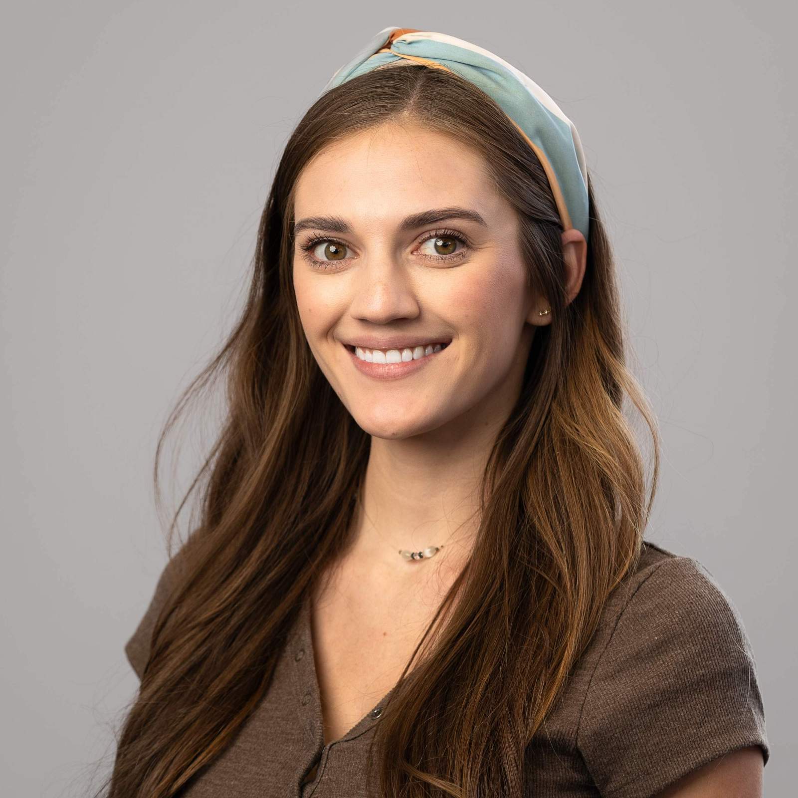 Picture of Brittany in front of gray background