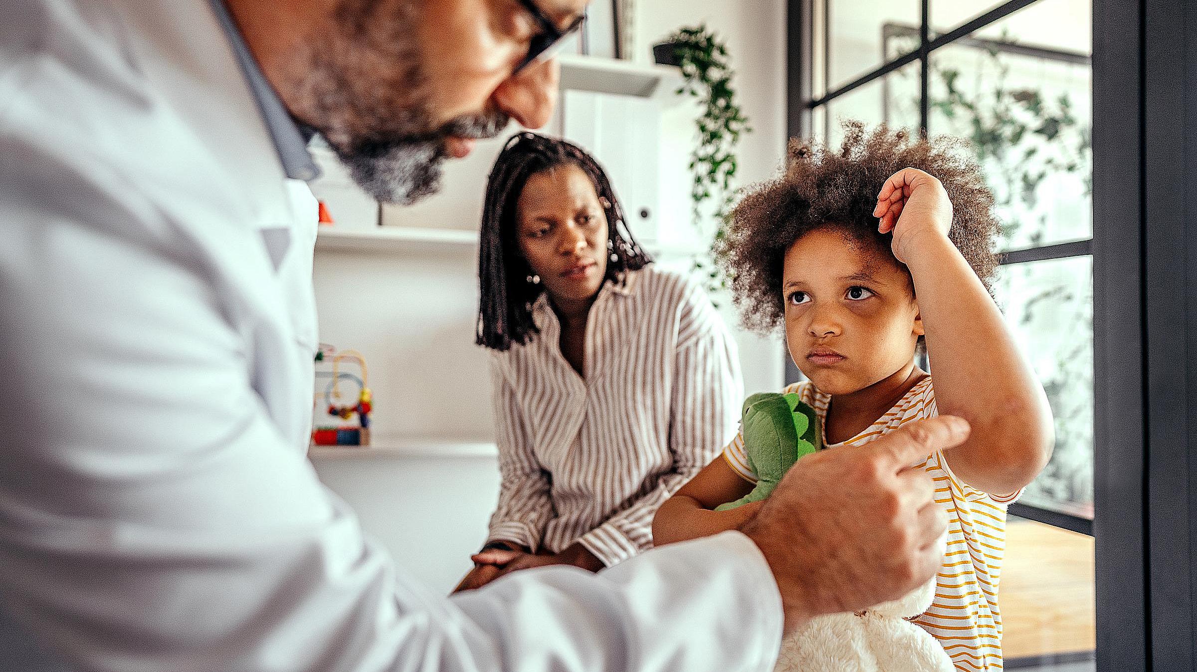 Woman and child at doctors
