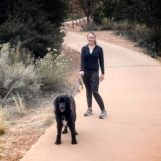 Dr. Elisabeth Mulroy, MD hiking with dog