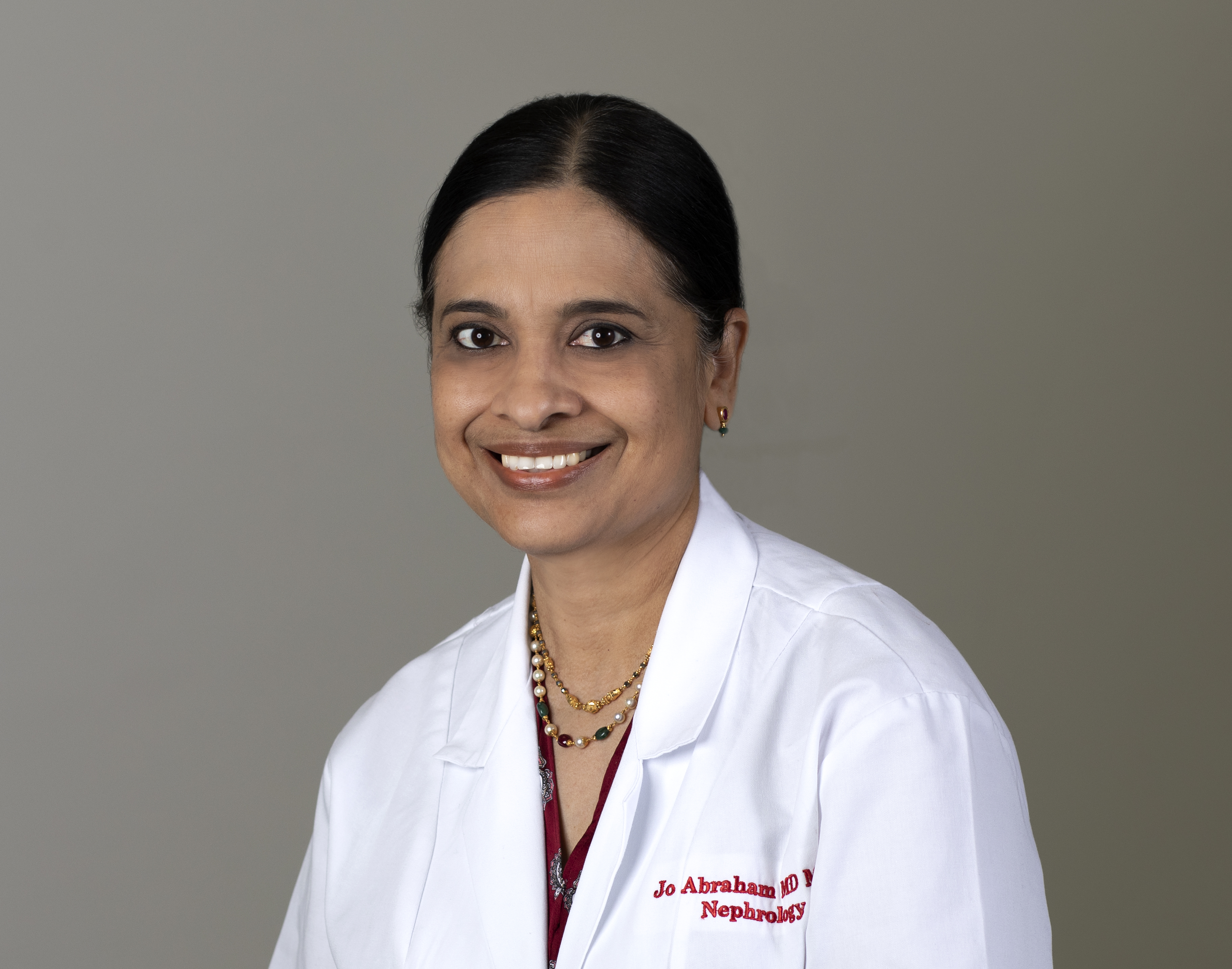 Dr. Jo Abraham