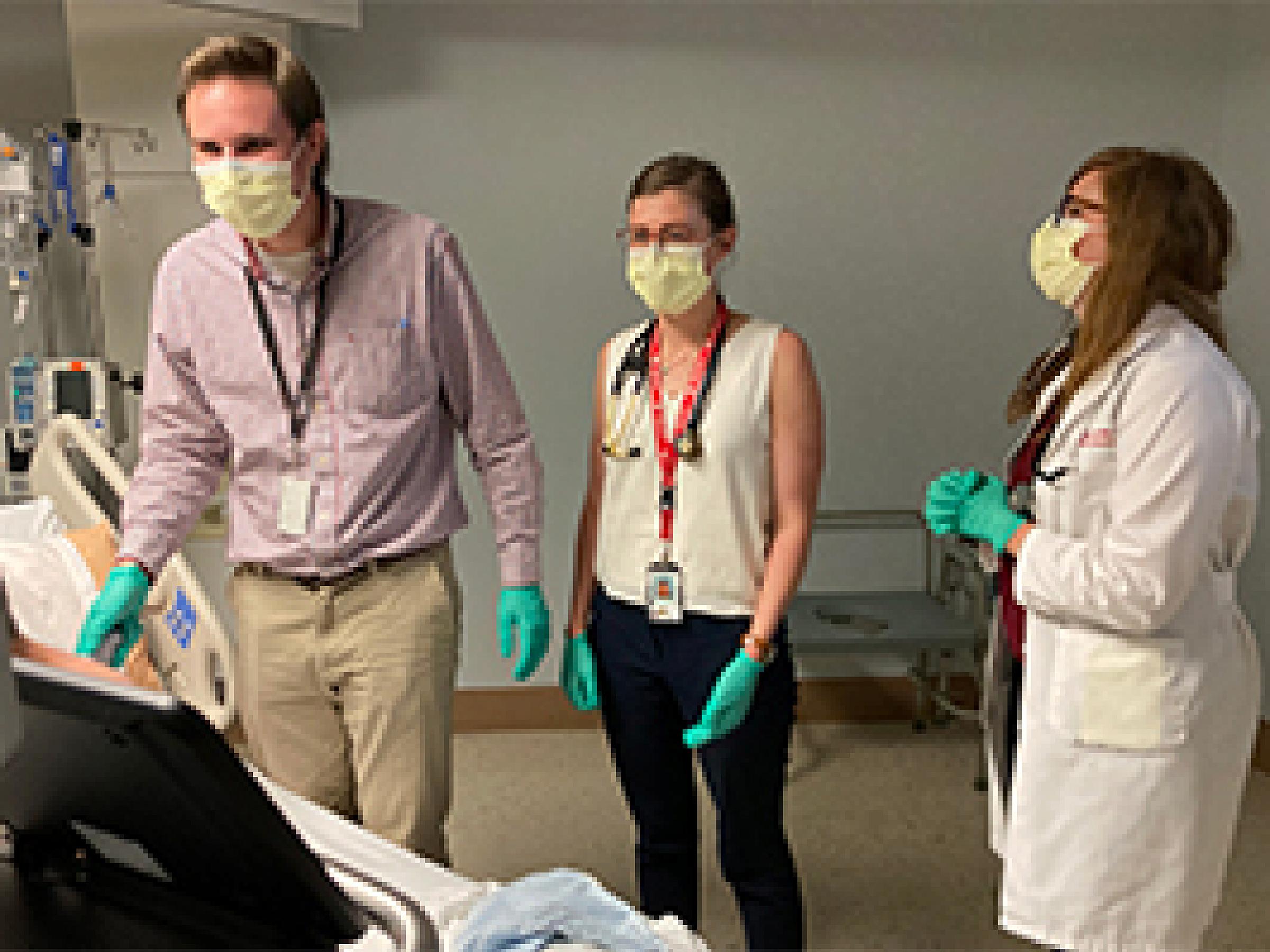 3 hospitalists in a hospital room