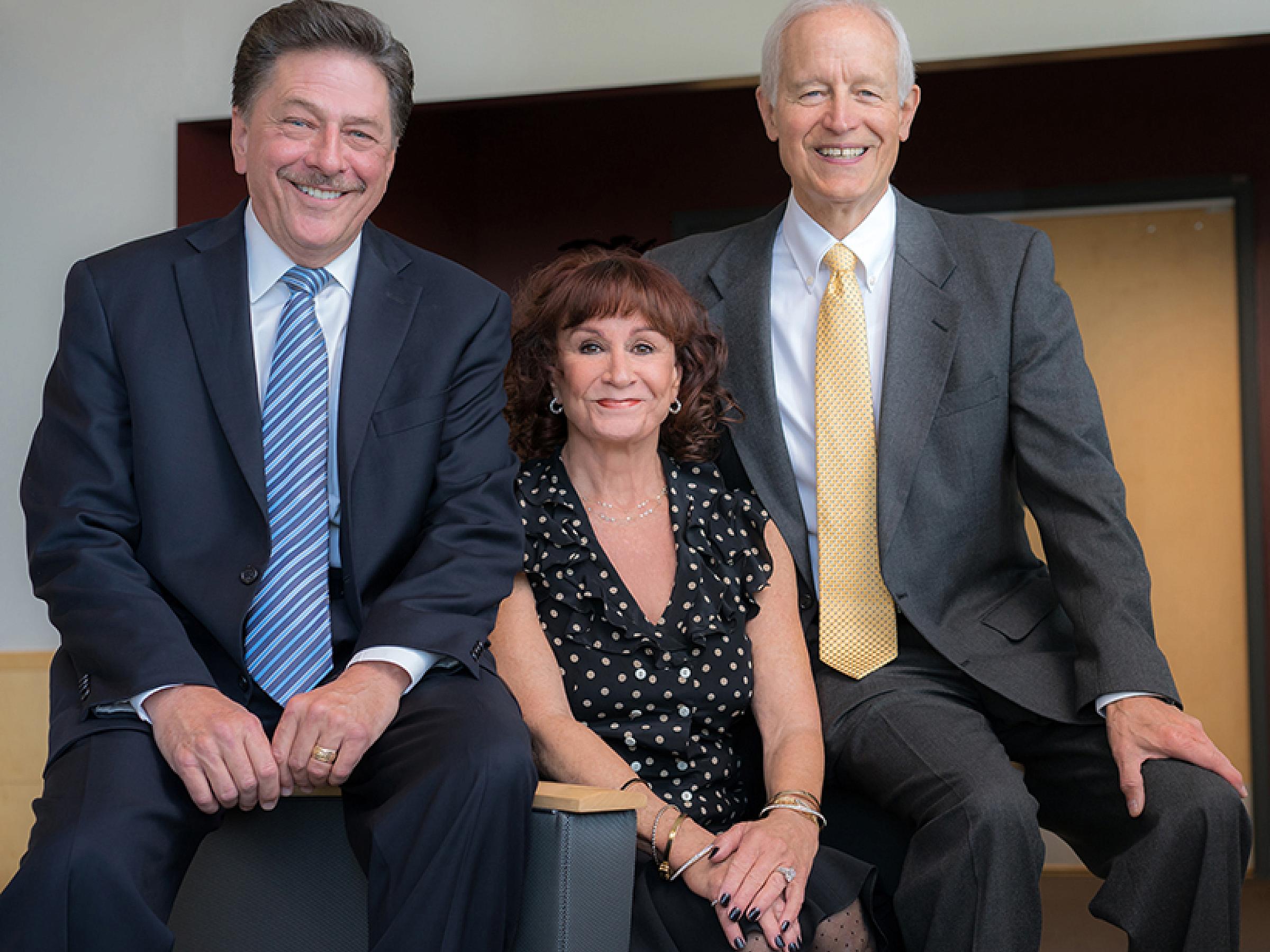 From left, SCTM Executive Director Gregory S. Hageman, PhD; Sharon Eccles Steele; and Moran CEO Randall J Olson, MD.