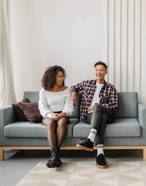 2 students sitting on couch