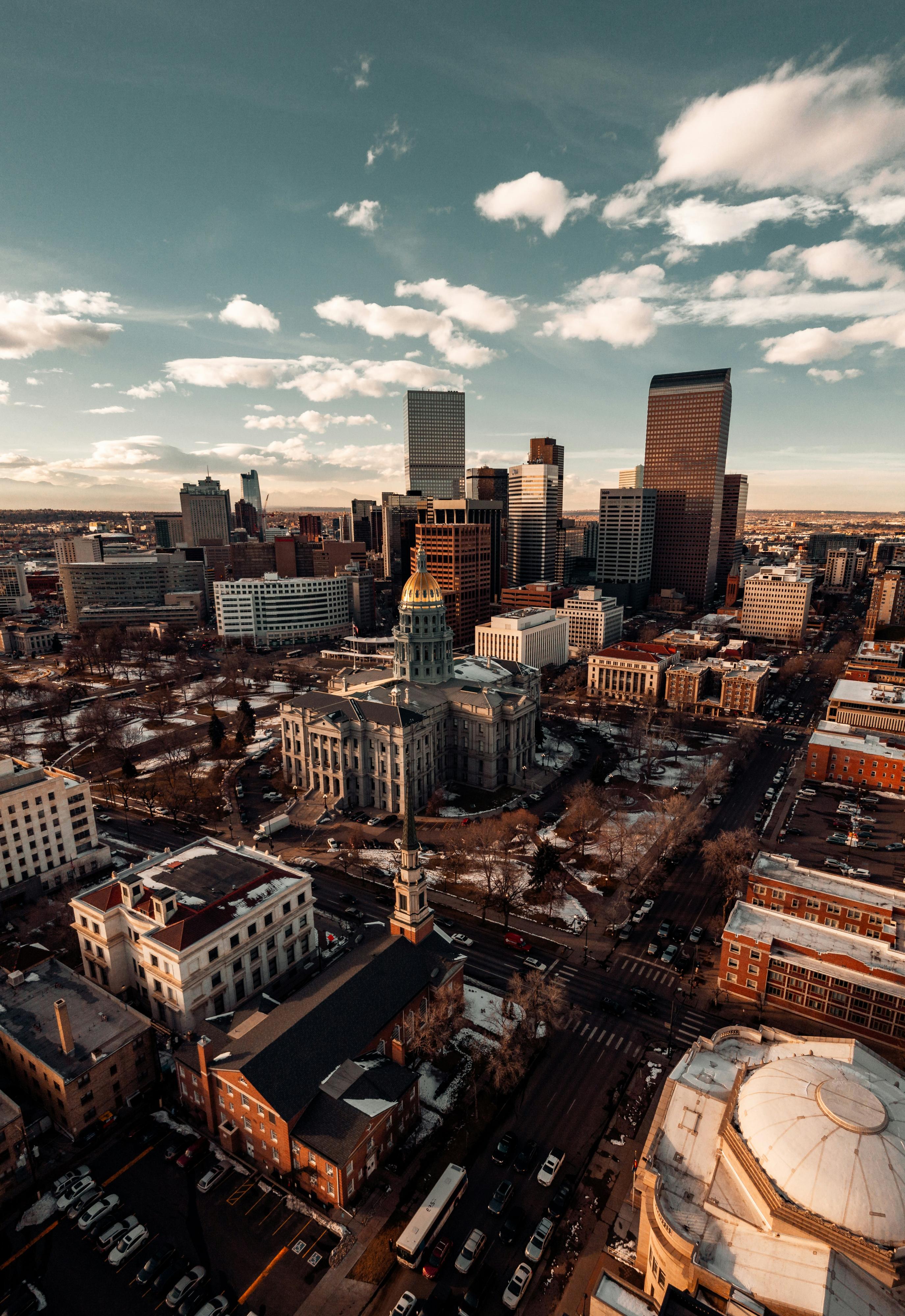 Aerial image of city buildings in Denver, CO