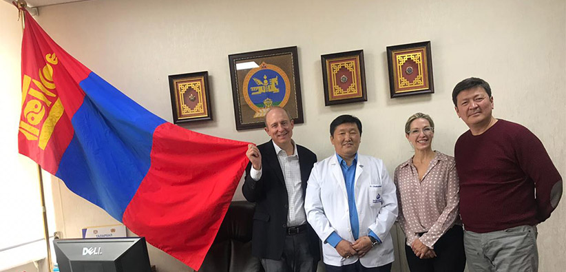 Doctors with Mongolian flag