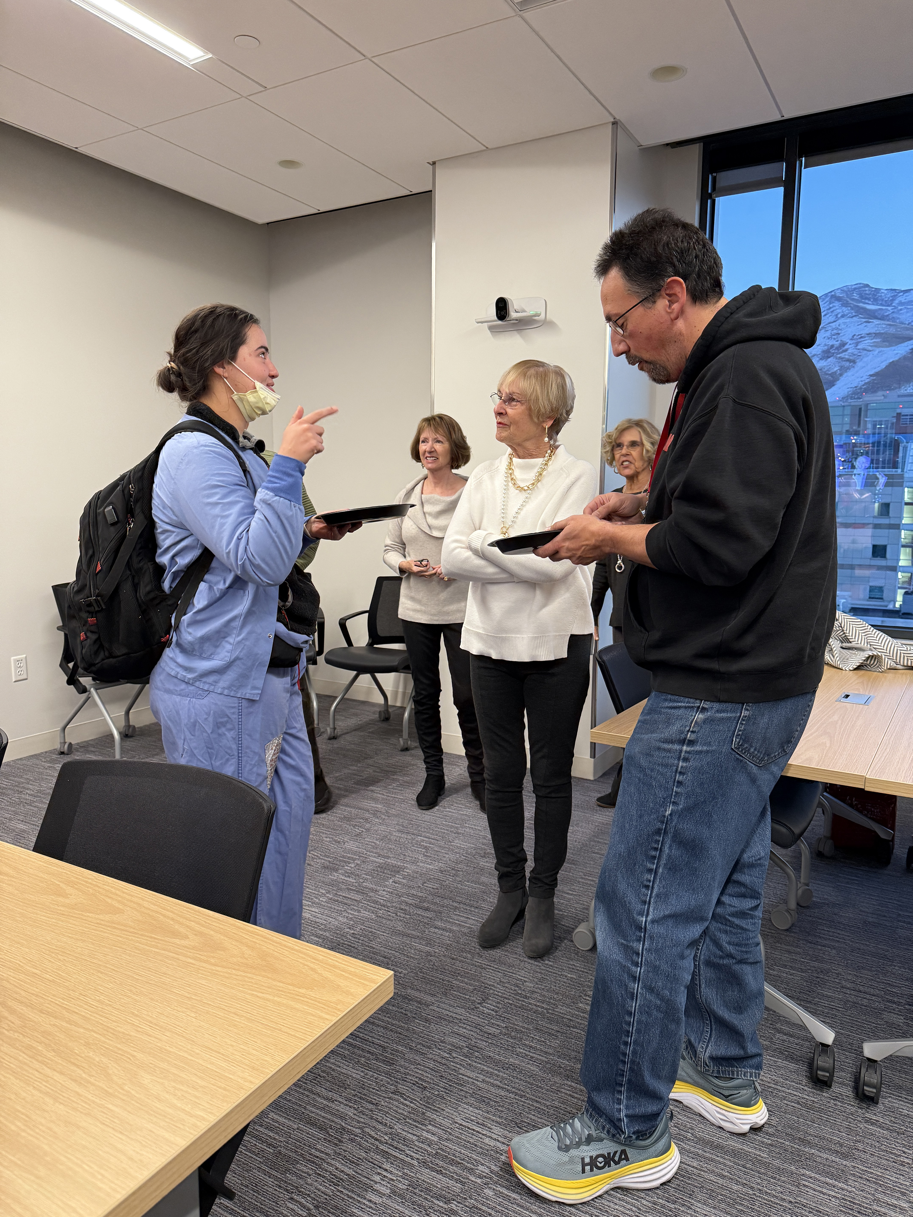 Resident, Dr. Agarwala, chatting with Marianne Cahalan.