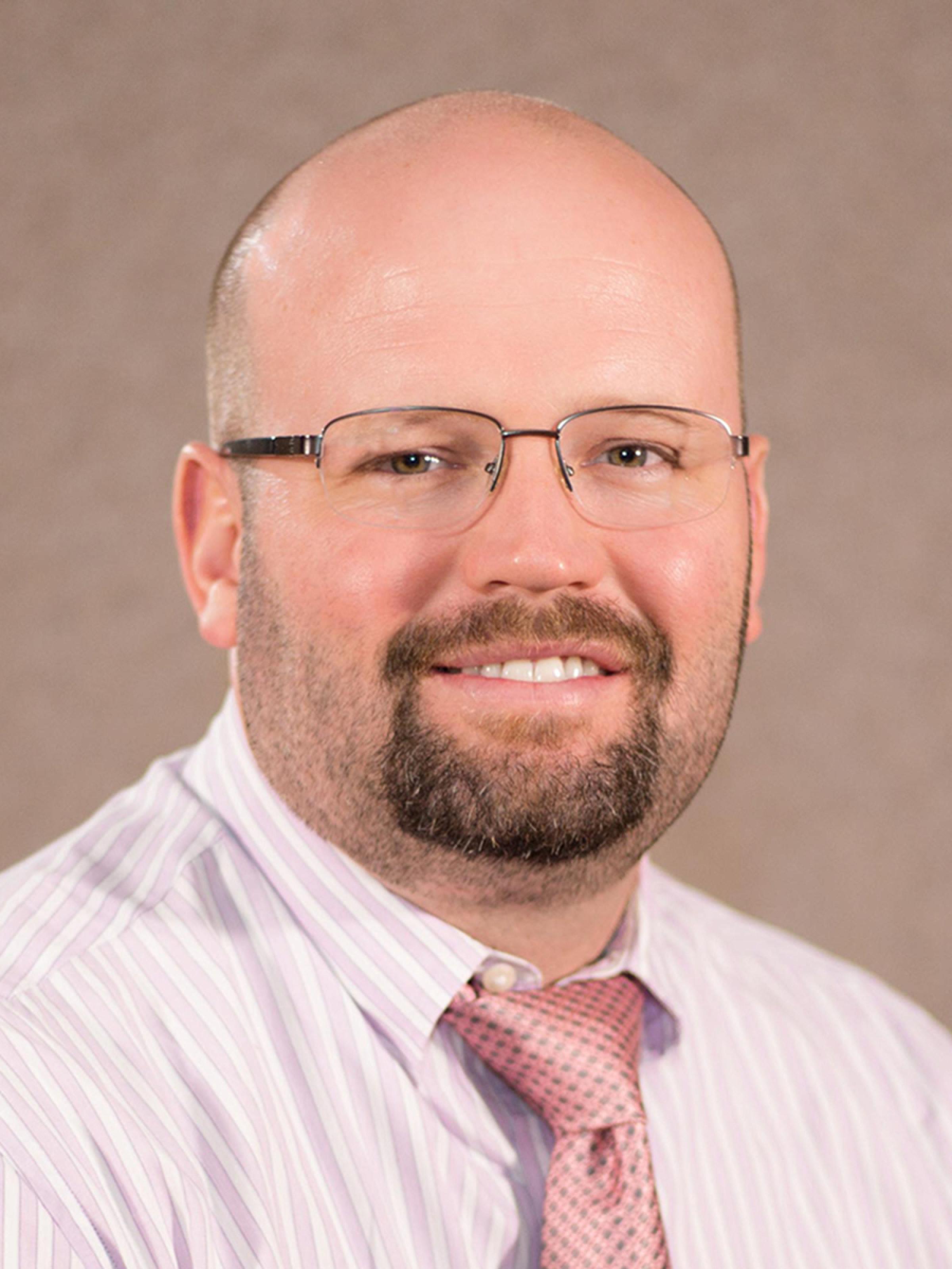 A portrait of Jacob Pollard, MD. 