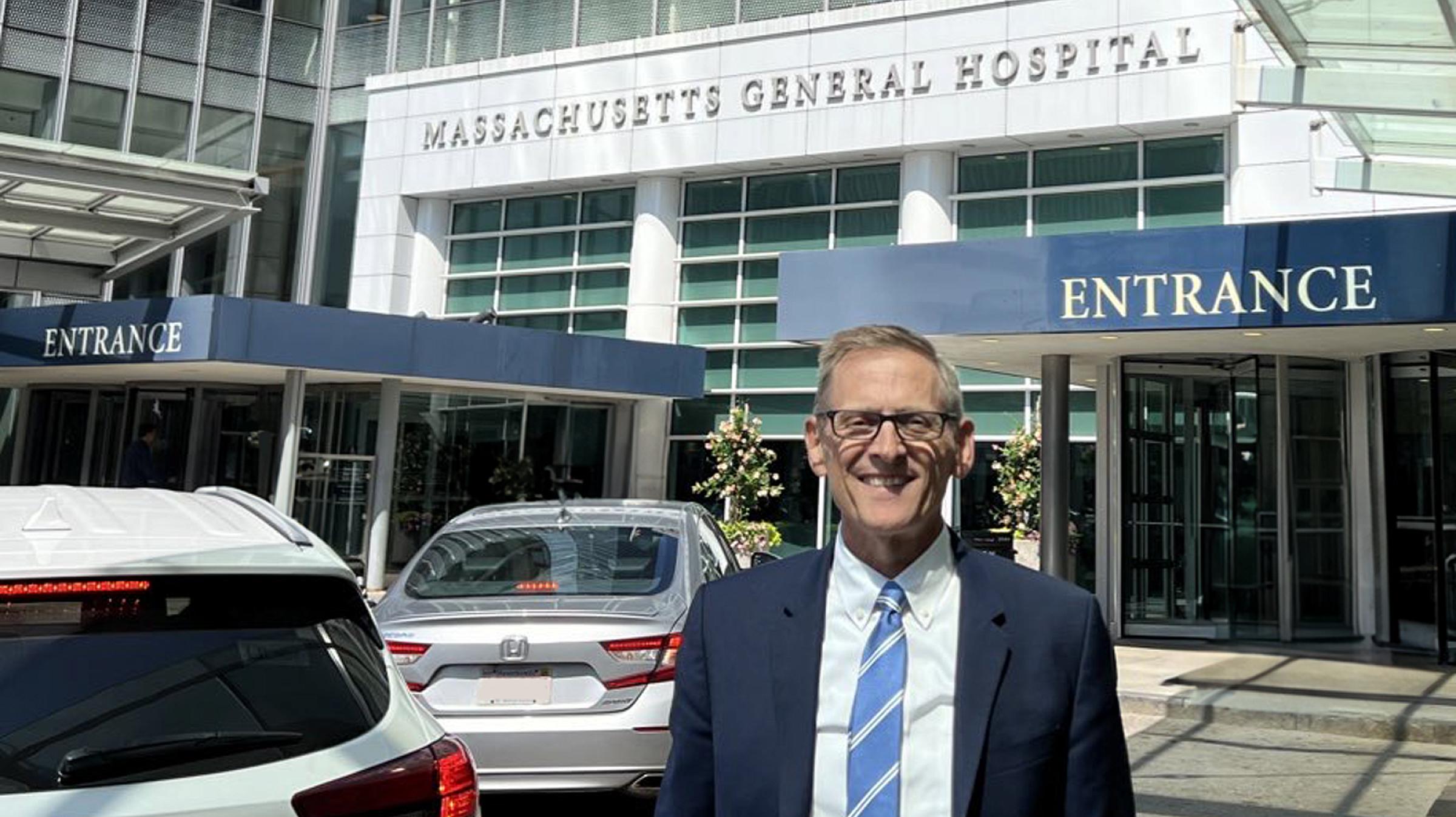 Dr. Egan in front of Massachusetts General Hospital.