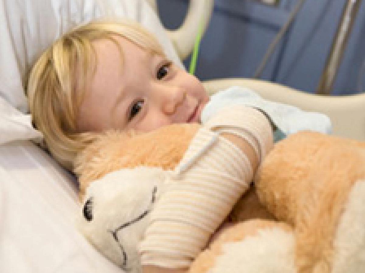 Child in Critical Care with Stuffed Animal