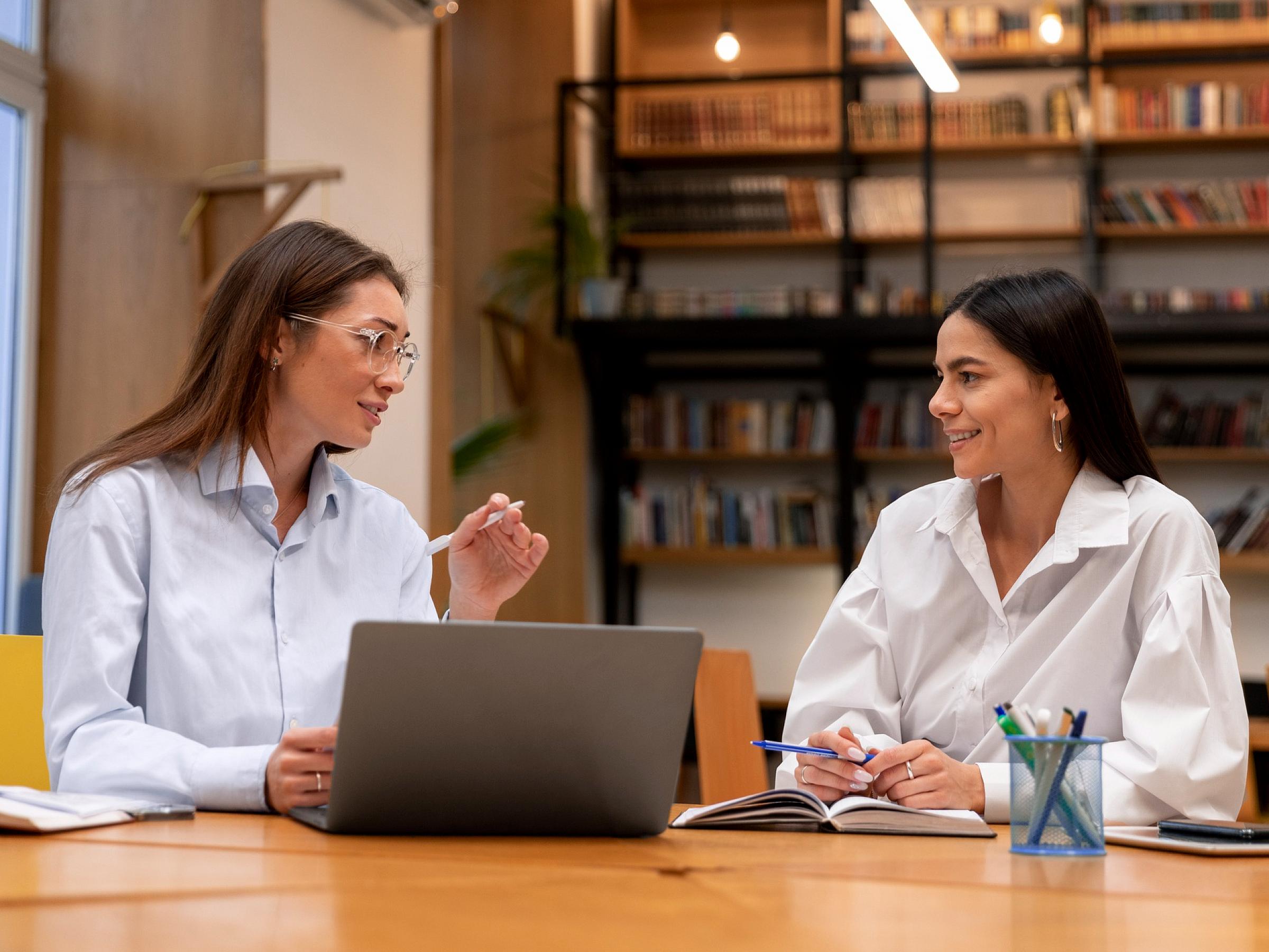 two women having a meeting