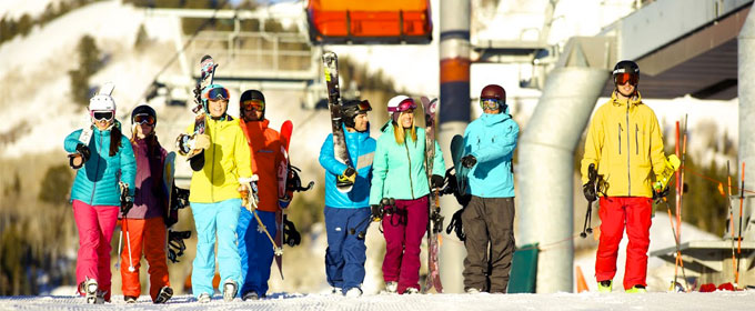 Skiers and snowboarders